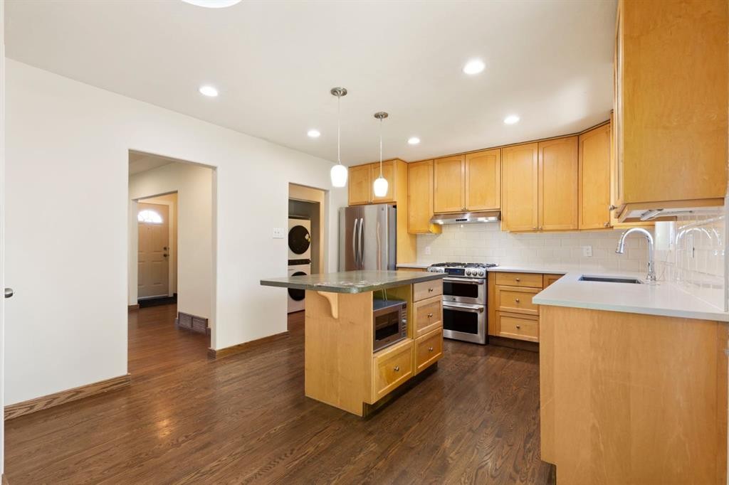 69 Winslow Crescent Sw, Calgary, AB - Indoor Photo Showing Kitchen With Stainless Steel Kitchen With Upgraded Kitchen