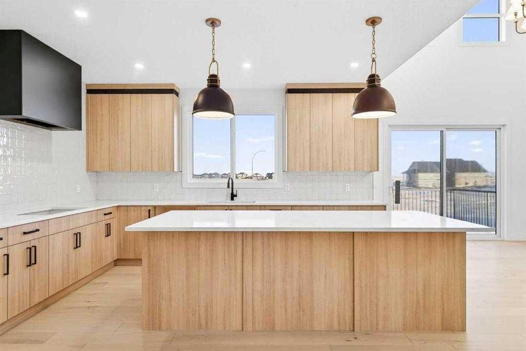 539 Waterford Rise, Chestermere, AB - Indoor Photo Showing Kitchen With Upgraded Kitchen