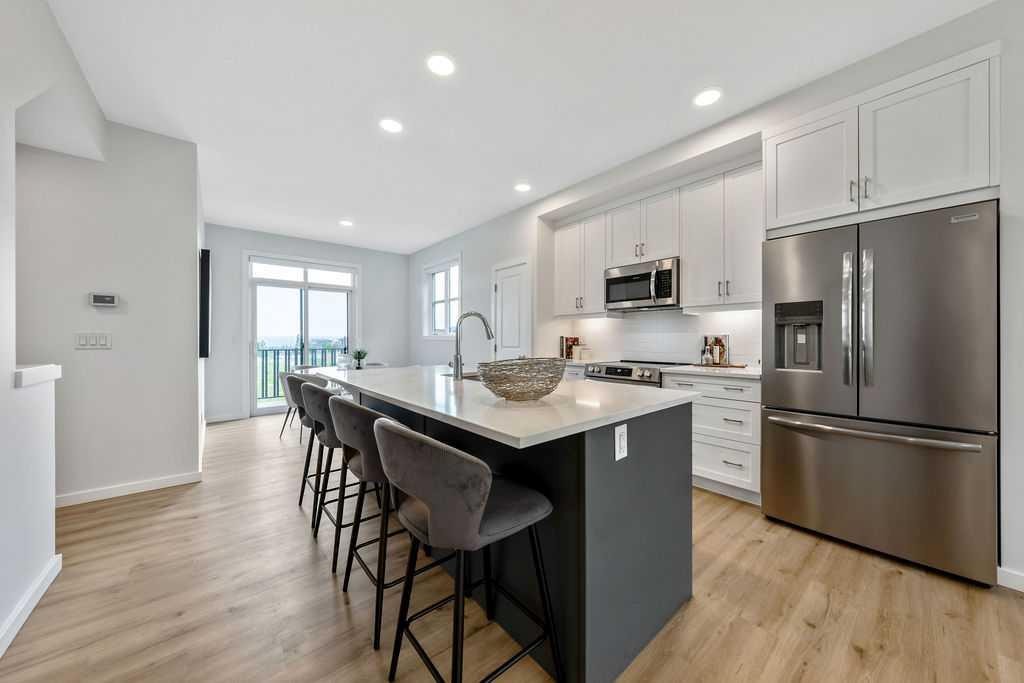 86 Spring Willow Close Sw, Calgary, AB - Indoor Photo Showing Kitchen With Stainless Steel Kitchen With Upgraded Kitchen