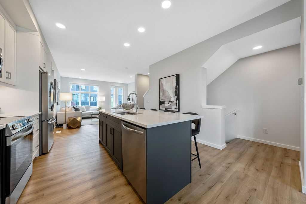 86 Spring Willow Close Sw, Calgary, AB - Indoor Photo Showing Kitchen With Stainless Steel Kitchen With Upgraded Kitchen