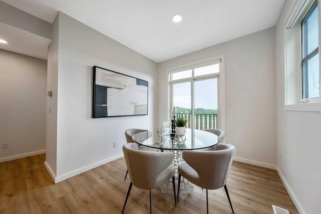 86 Spring Willow Close Sw, Calgary, AB - Indoor Photo Showing Dining Room