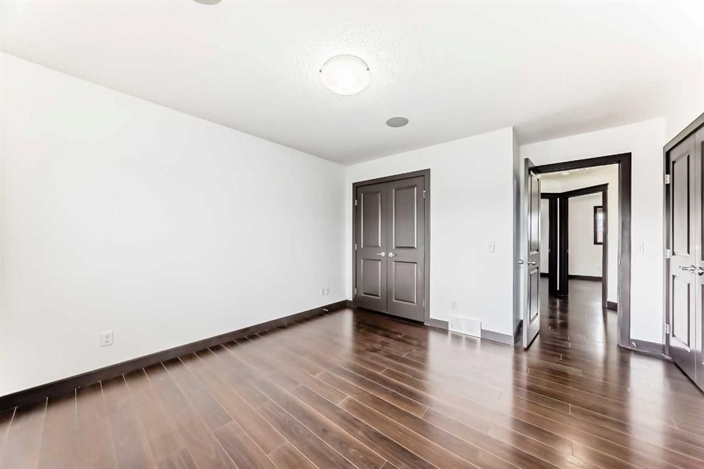17 Redstone Common Ne, Calgary, AB - Indoor Photo Showing Other Room With Fireplace