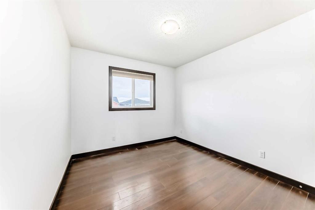 17 Redstone Common Ne, Calgary, AB - Indoor Photo Showing Other Room