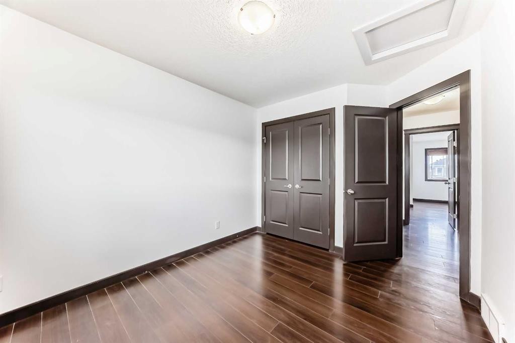 17 Redstone Common Ne, Calgary, AB - Indoor Photo Showing Other Room