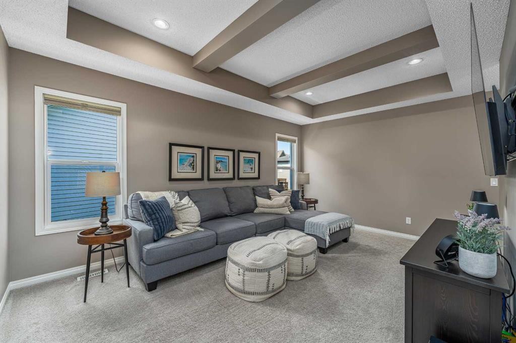 220 Copperpond Green Se, Calgary, AB - Indoor Photo Showing Living Room