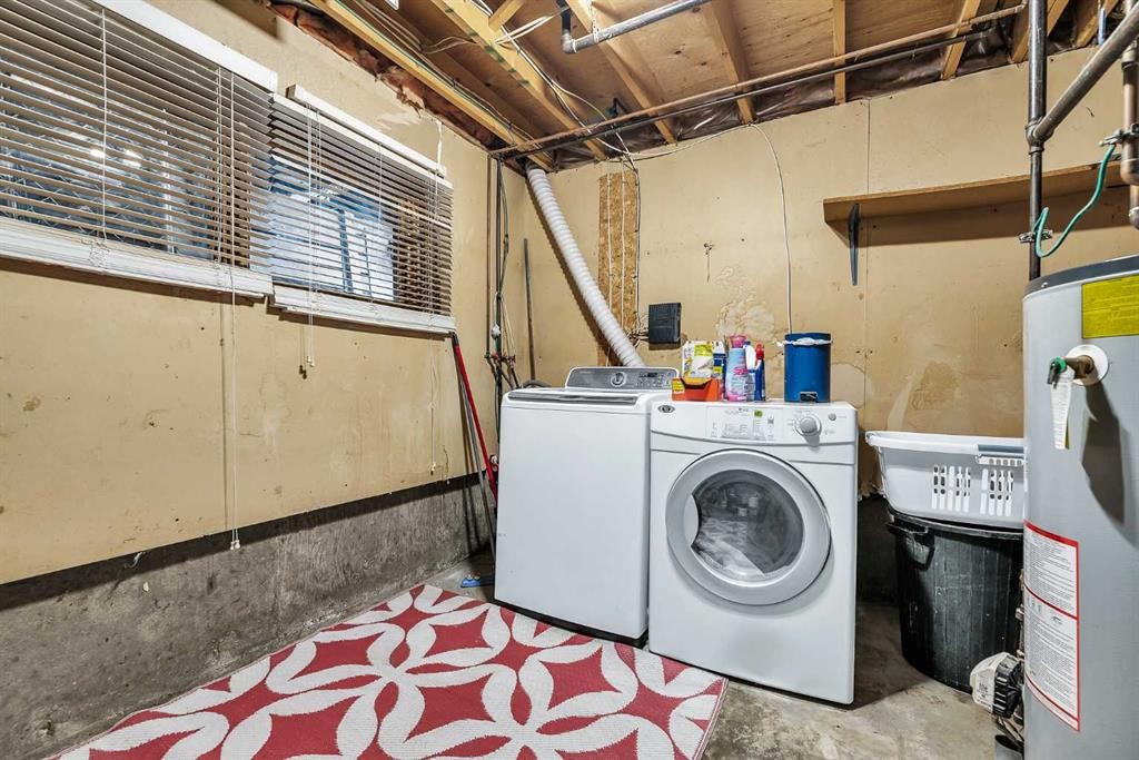 215 Erin Woods Drive Se, Calgary, AB - Indoor Photo Showing Laundry Room