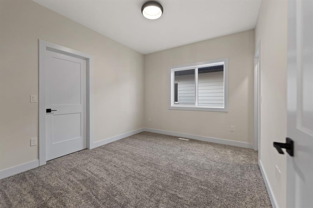 39 South Shore Road, Chestermere, AB - Indoor Photo Showing Other Room