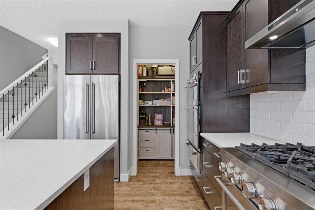 117 Auburn Glen Drive Se, Calgary, AB - Indoor Photo Showing Kitchen With Stainless Steel Kitchen With Upgraded Kitchen