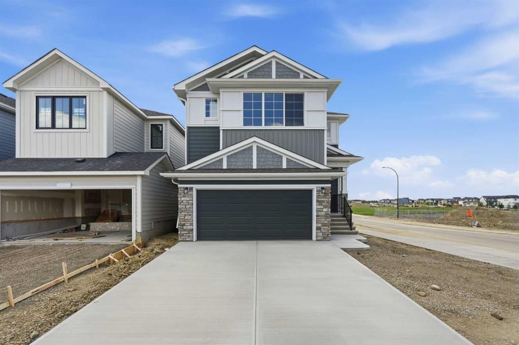 7 Verdure Gate Sw, Calgary, AB - Outdoor With Facade