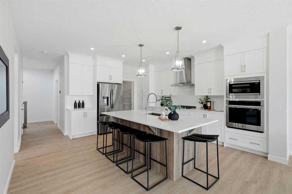 7 Verdure Gate Sw, Calgary, AB - Indoor Photo Showing Kitchen With Stainless Steel Kitchen With Upgraded Kitchen