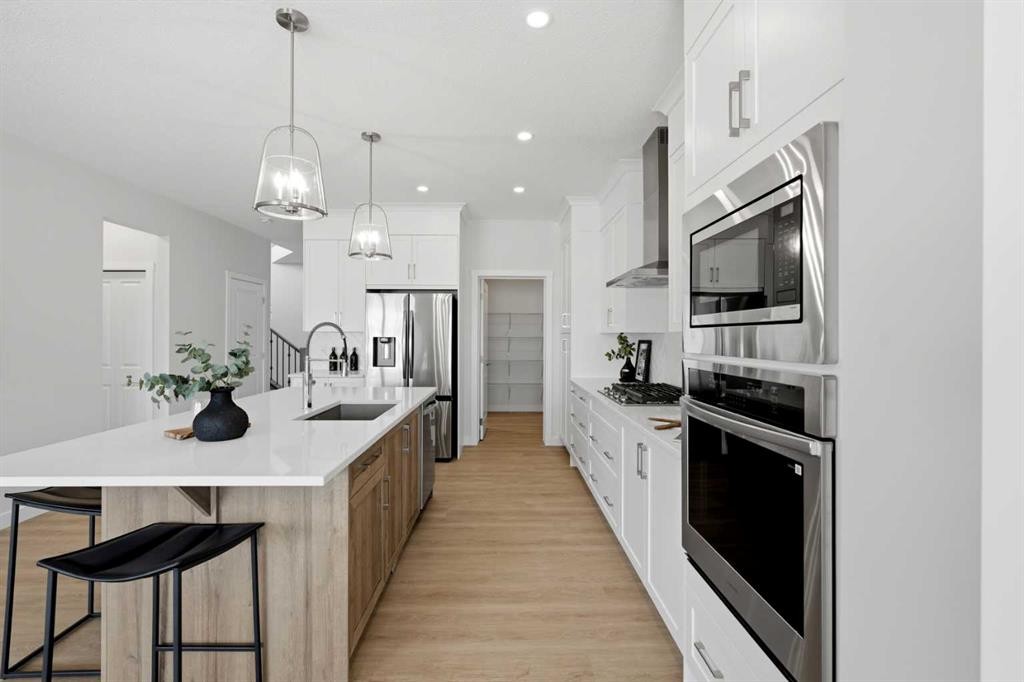 7 Verdure Gate Sw, Calgary, AB - Indoor Photo Showing Kitchen With Stainless Steel Kitchen With Upgraded Kitchen