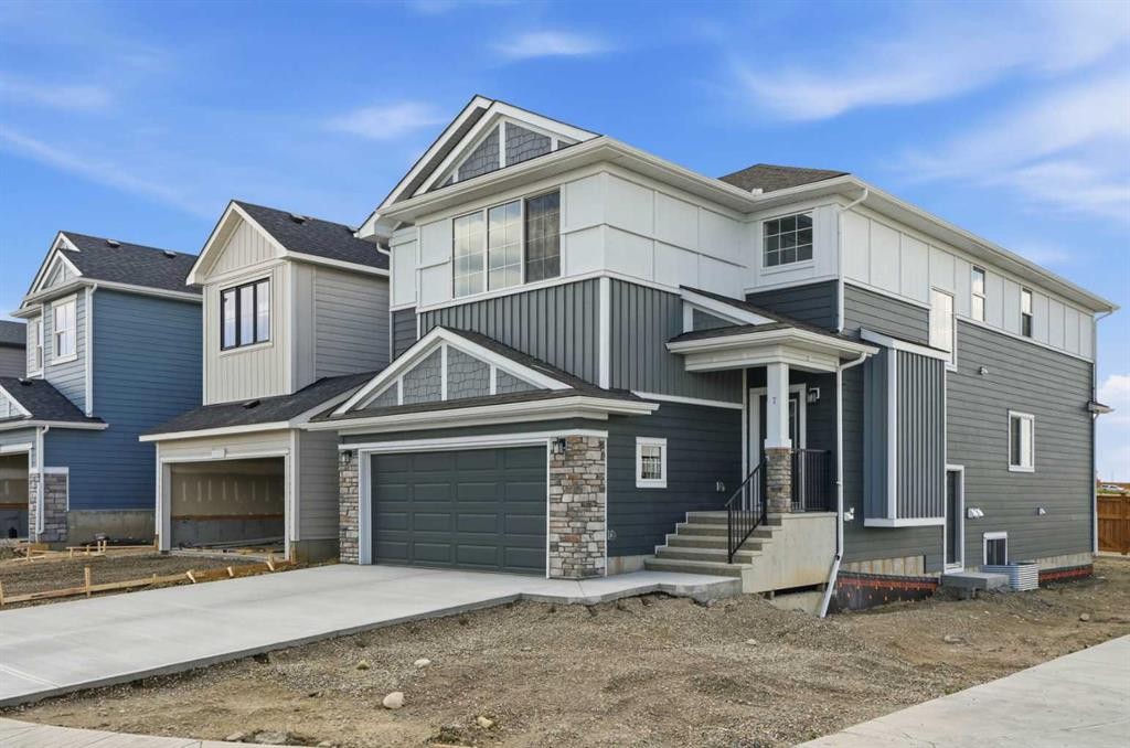 7 Verdure Gate Sw, Calgary, AB - Outdoor With Facade