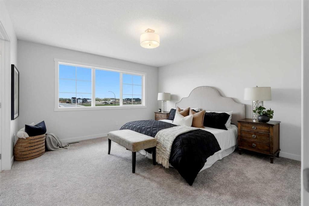 7 Verdure Gate Sw, Calgary, AB - Indoor Photo Showing Bedroom