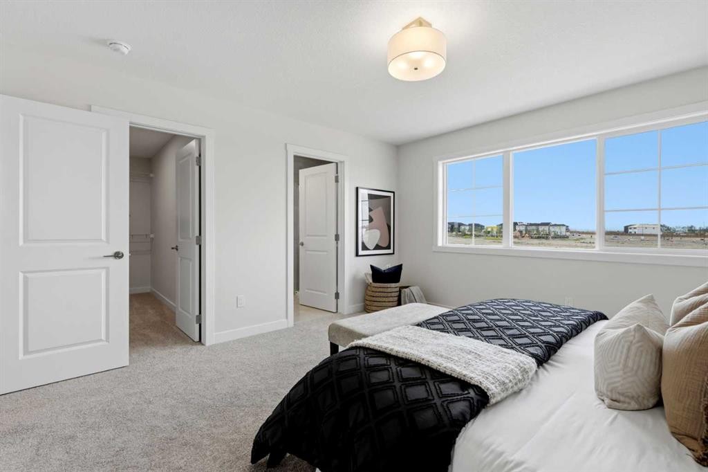 7 Verdure Gate Sw, Calgary, AB - Indoor Photo Showing Bedroom