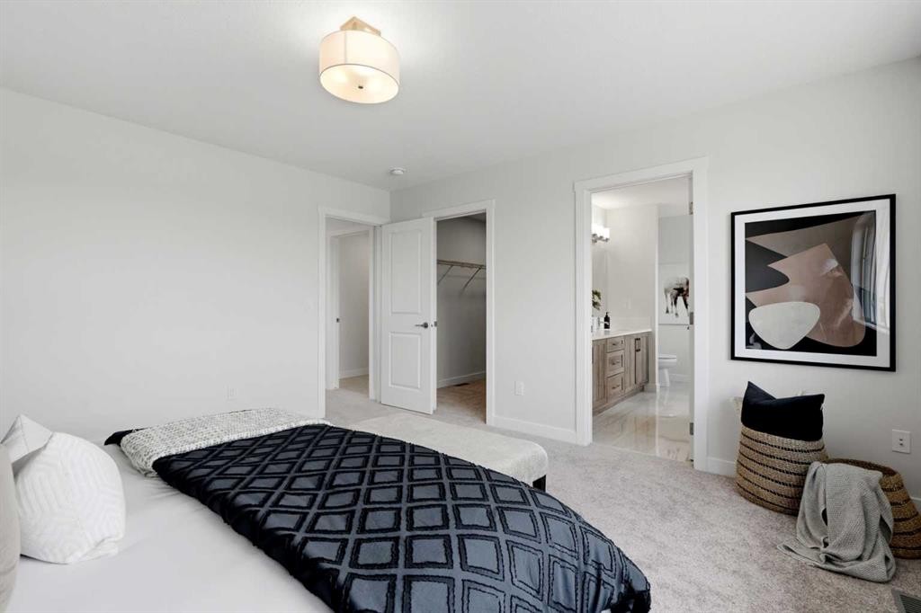 7 Verdure Gate Sw, Calgary, AB - Indoor Photo Showing Bedroom