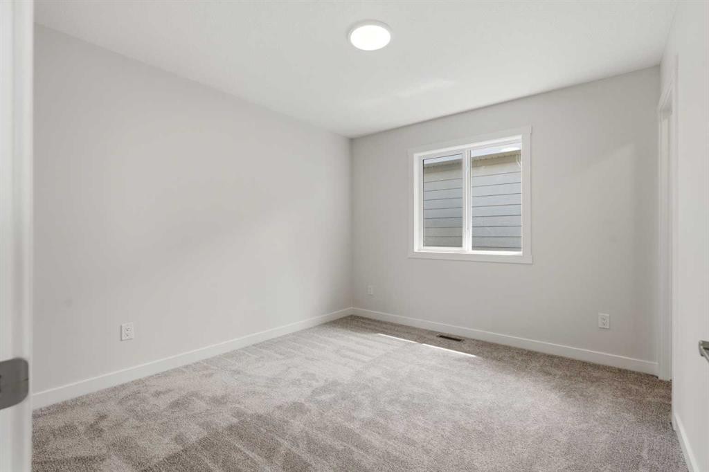7 Verdure Gate Sw, Calgary, AB - Indoor Photo Showing Other Room