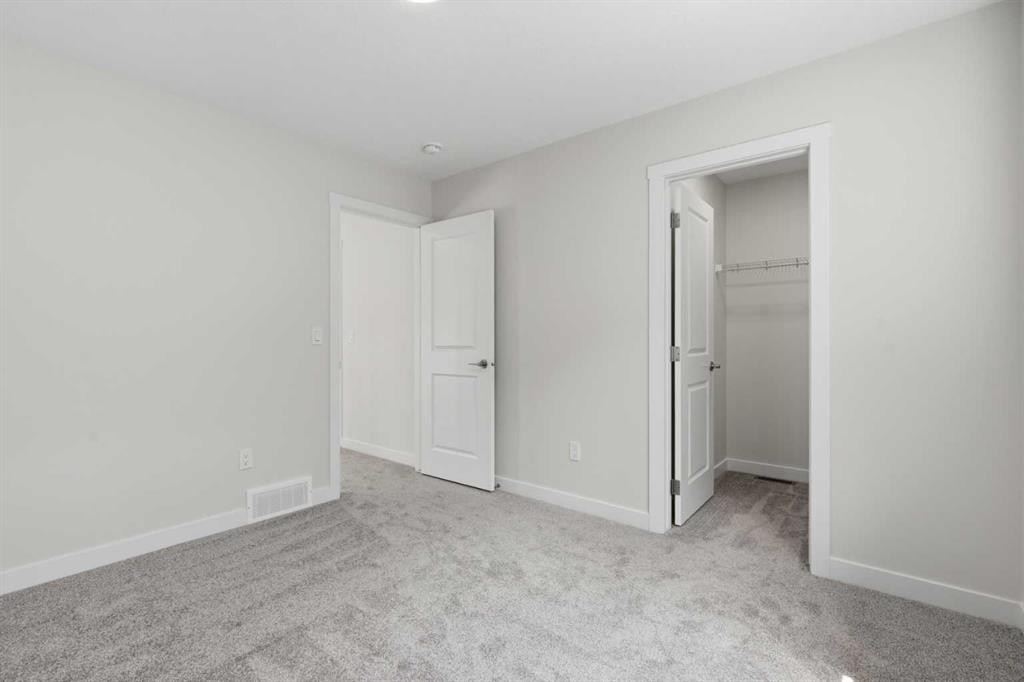7 Verdure Gate Sw, Calgary, AB - Indoor Photo Showing Other Room