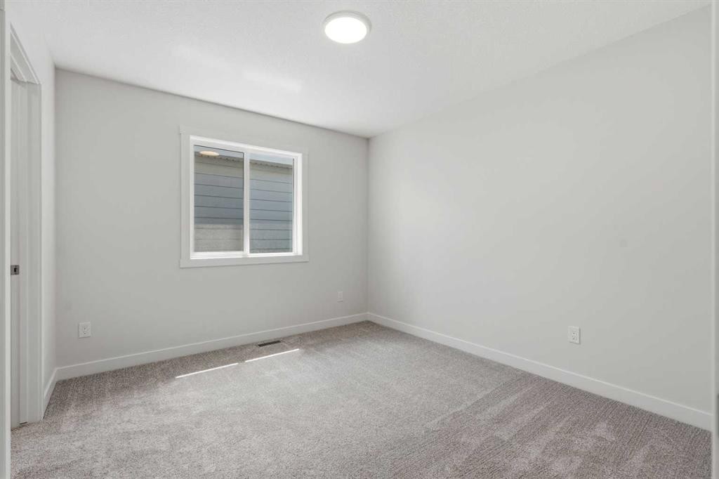 7 Verdure Gate Sw, Calgary, AB - Indoor Photo Showing Other Room