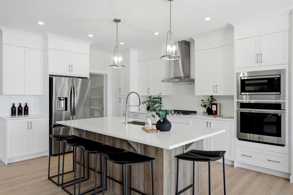 7 Verdure Gate Sw, Calgary, AB - Indoor Photo Showing Kitchen With Stainless Steel Kitchen With Upgraded Kitchen