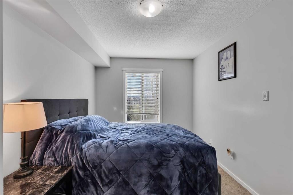 5312-755 Copperpond Boulevard Se, Calgary, AB - Indoor Photo Showing Bedroom