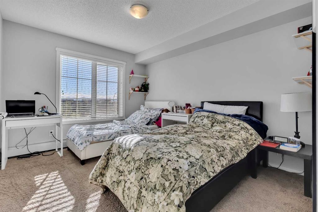 5312-755 Copperpond Boulevard Se, Calgary, AB - Indoor Photo Showing Bedroom