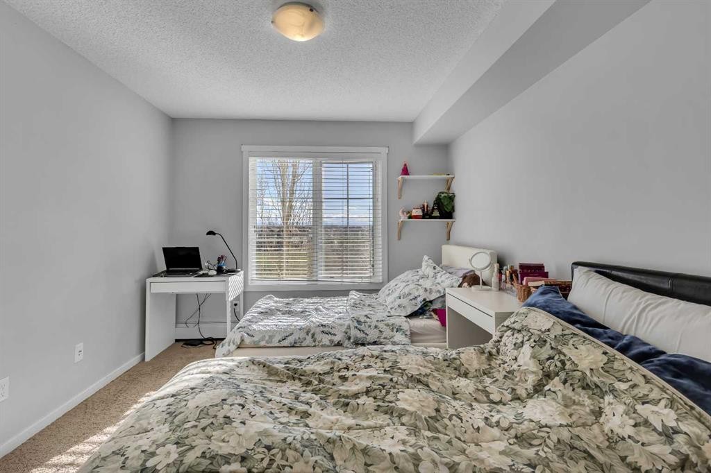 5312-755 Copperpond Boulevard Se, Calgary, AB - Indoor Photo Showing Bedroom
