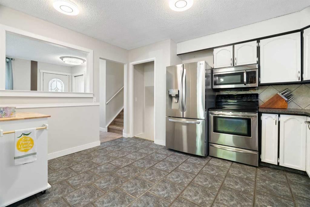 76 Pinebrook Close Ne, Calgary, AB - Indoor Photo Showing Kitchen With Stainless Steel Kitchen