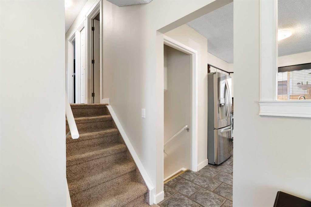 76 Pinebrook Close Ne, Calgary, AB - Indoor Photo Showing Other Room