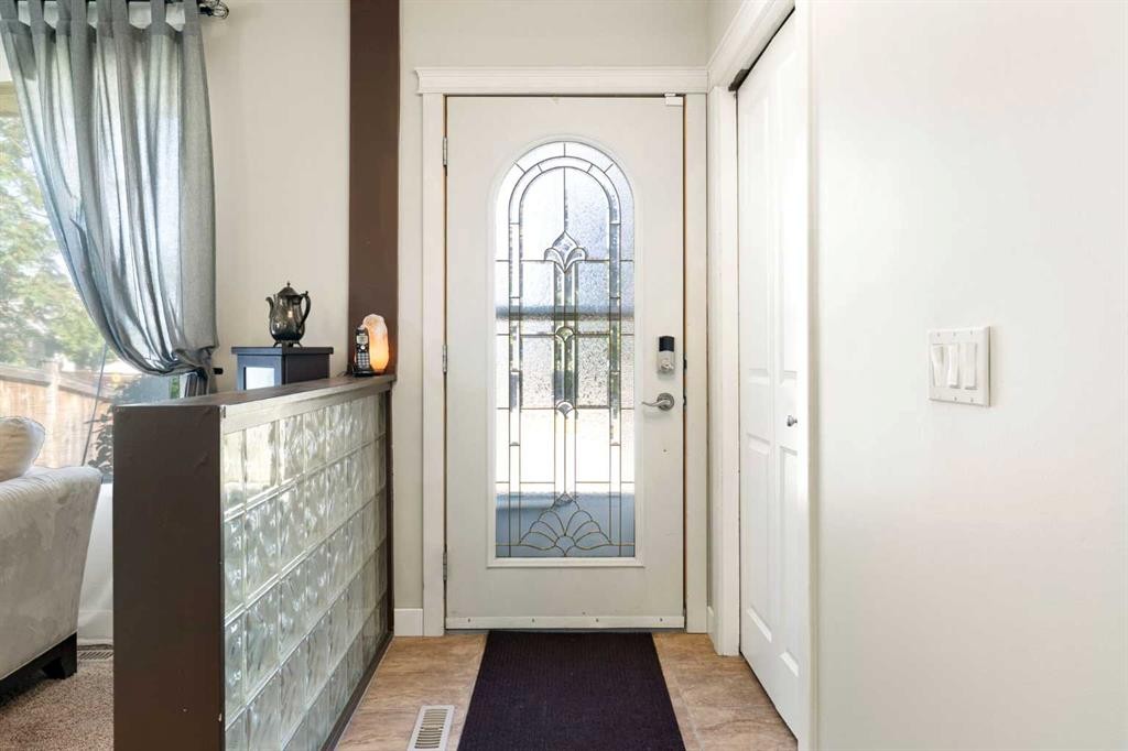 76 Pinebrook Close Ne, Calgary, AB - Indoor Photo Showing Other Room