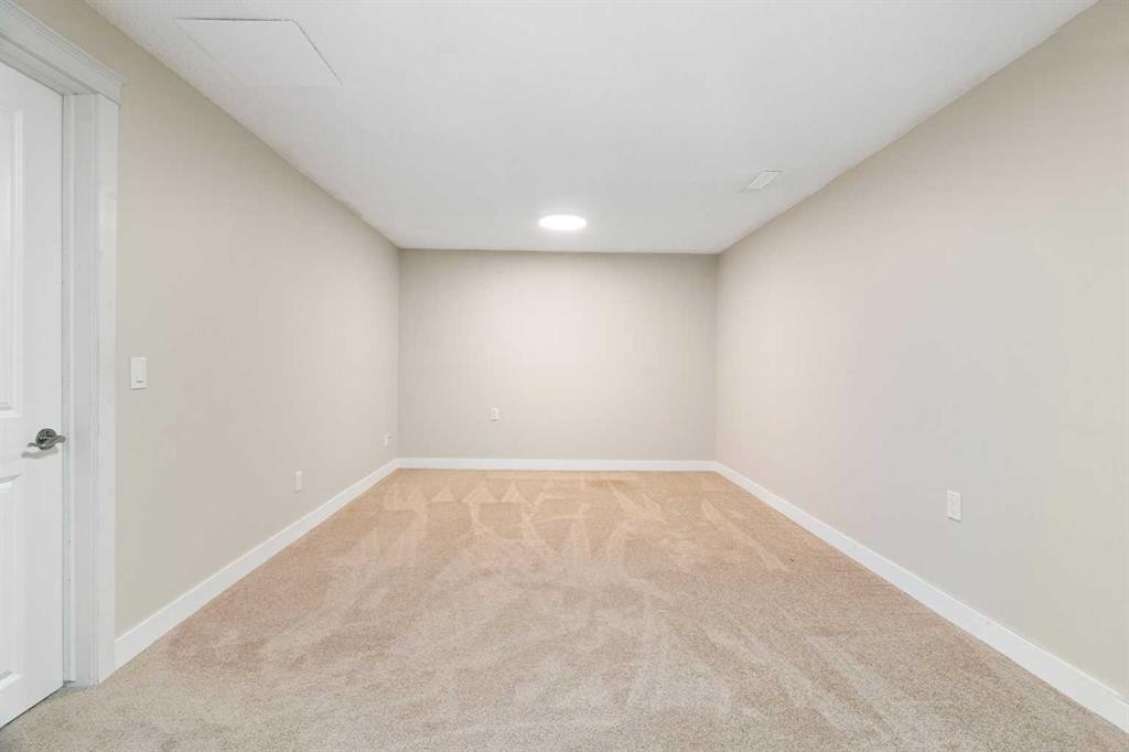 76 Pinebrook Close Ne, Calgary, AB - Indoor Photo Showing Other Room