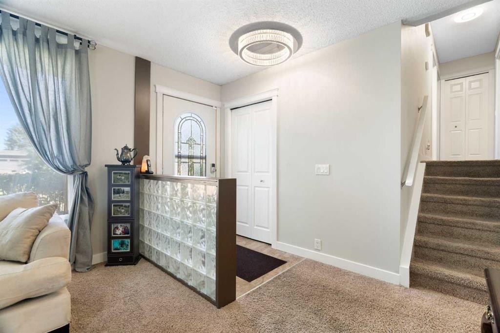 76 Pinebrook Close Ne, Calgary, AB - Indoor Photo Showing Other Room
