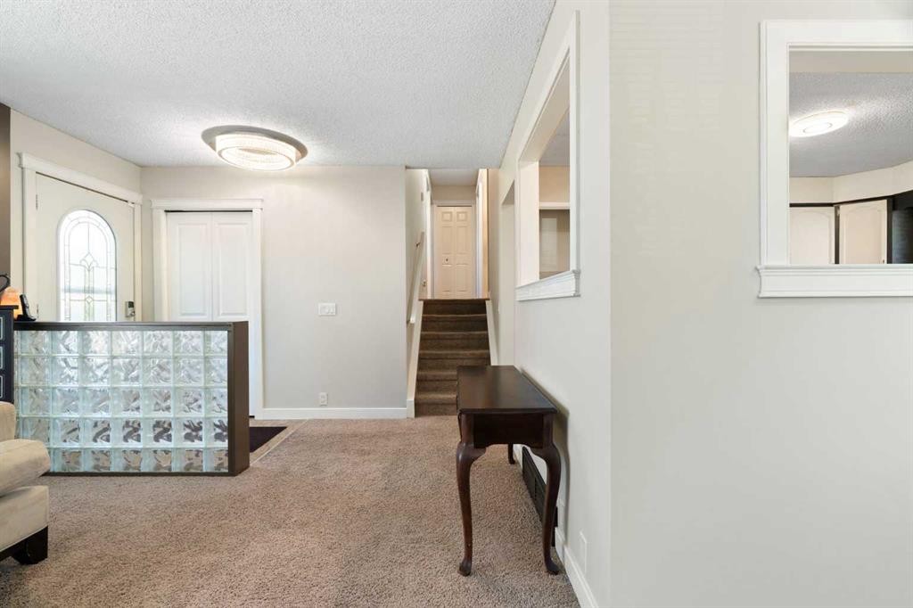 76 Pinebrook Close Ne, Calgary, AB - Indoor Photo Showing Other Room