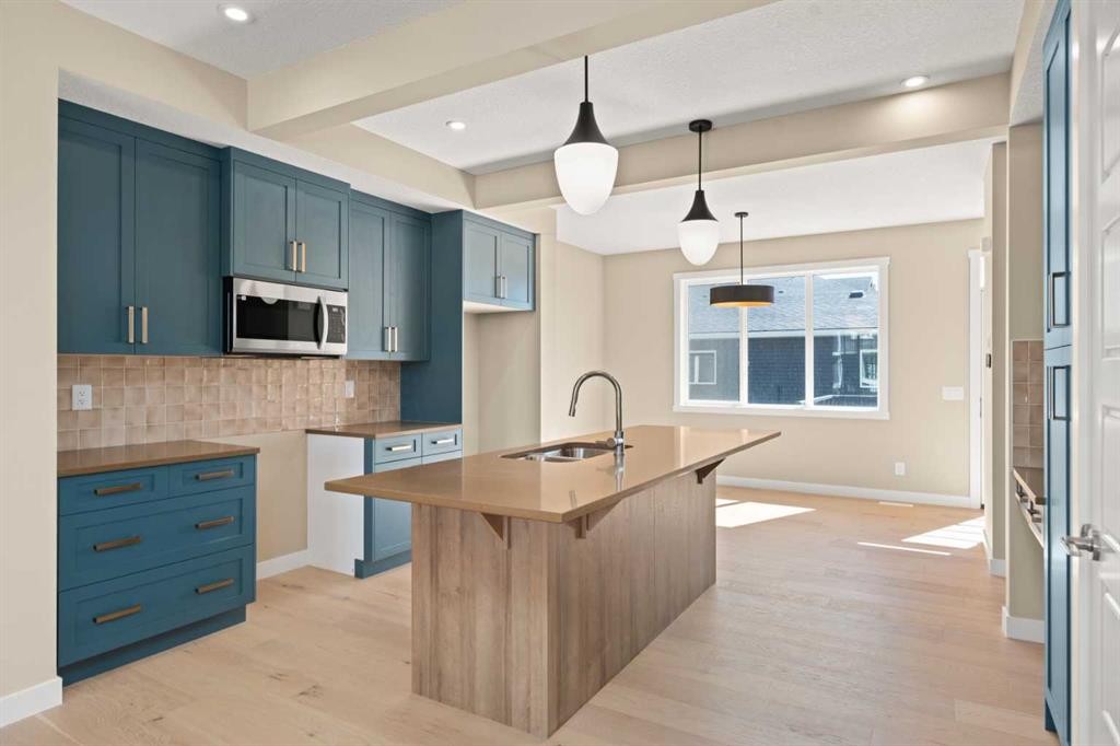 416 Sora Boulevard Se, Calgary, AB - Indoor Photo Showing Kitchen With Upgraded Kitchen