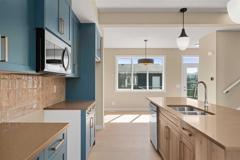 416 Sora Boulevard Se, Calgary, AB - Indoor Photo Showing Kitchen With Double Sink