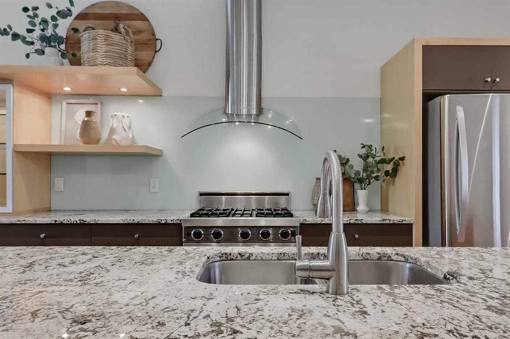 17 Somme Boulevard Sw, Calgary, AB - Indoor Photo Showing Kitchen With Stainless Steel Kitchen With Double Sink With Upgraded Kitchen