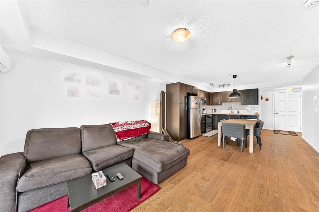 4302-755 Copperpond Boulevard Se, Calgary, AB - Indoor Photo Showing Living Room
