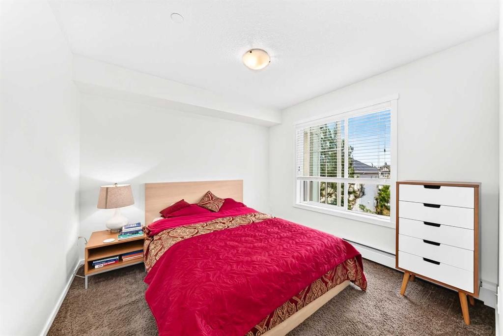 4302-755 Copperpond Boulevard Se, Calgary, AB - Indoor Photo Showing Bedroom