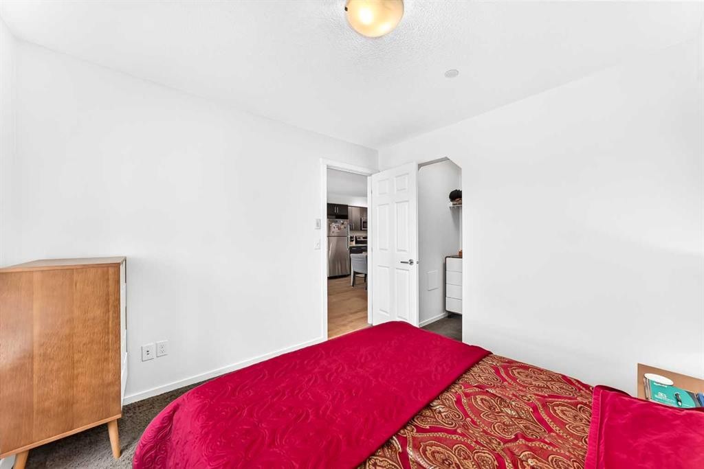 4302-755 Copperpond Boulevard Se, Calgary, AB - Indoor Photo Showing Bedroom
