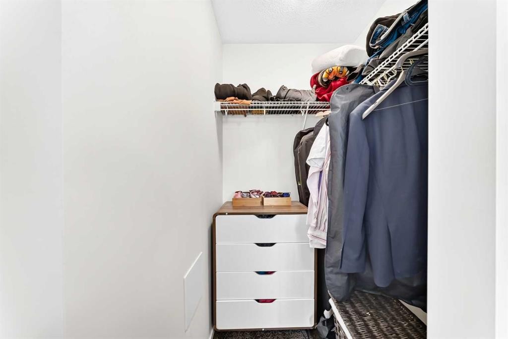 4302-755 Copperpond Boulevard Se, Calgary, AB - Indoor With Storage