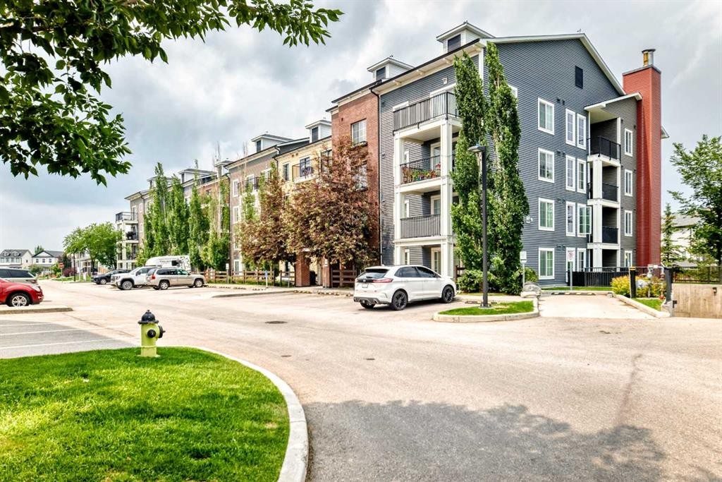 4302-755 Copperpond Boulevard Se, Calgary, AB - Outdoor With Facade