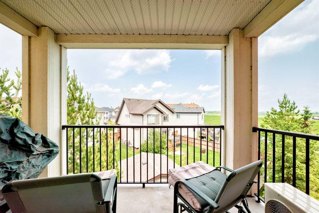 4302-755 Copperpond Boulevard Se, Calgary, AB - Outdoor With Deck Patio Veranda With Exterior
