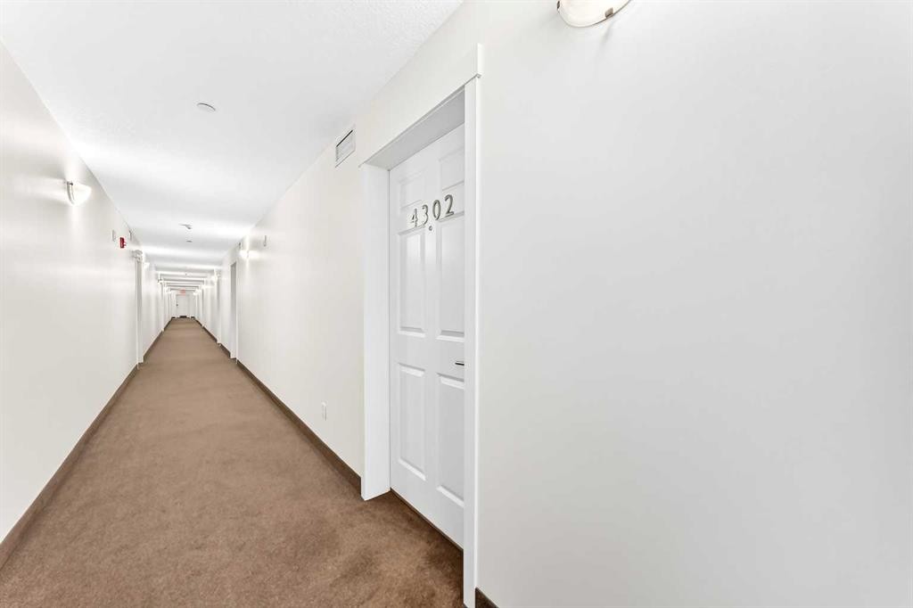 4302-755 Copperpond Boulevard Se, Calgary, AB - Indoor Photo Showing Other Room