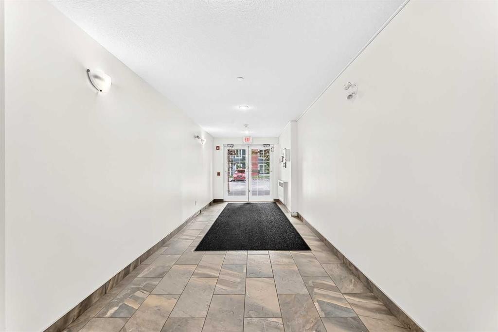 4302-755 Copperpond Boulevard Se, Calgary, AB - Indoor Photo Showing Other Room