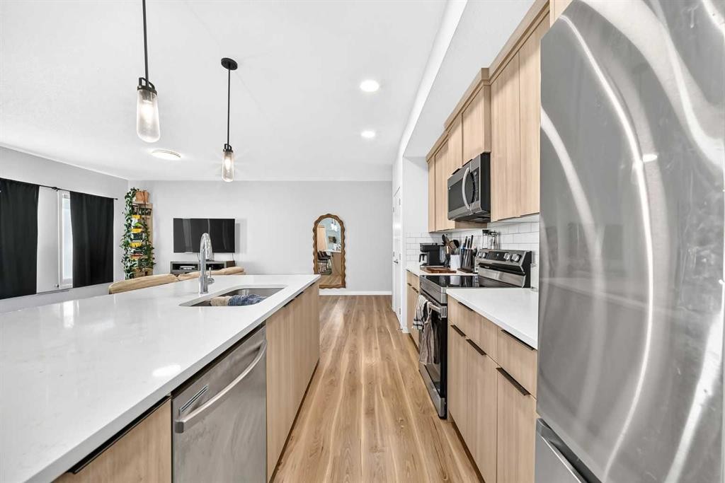 3208-220 Seton Grove Se, Calgary, AB - Indoor Photo Showing Kitchen With Double Sink With Upgraded Kitchen