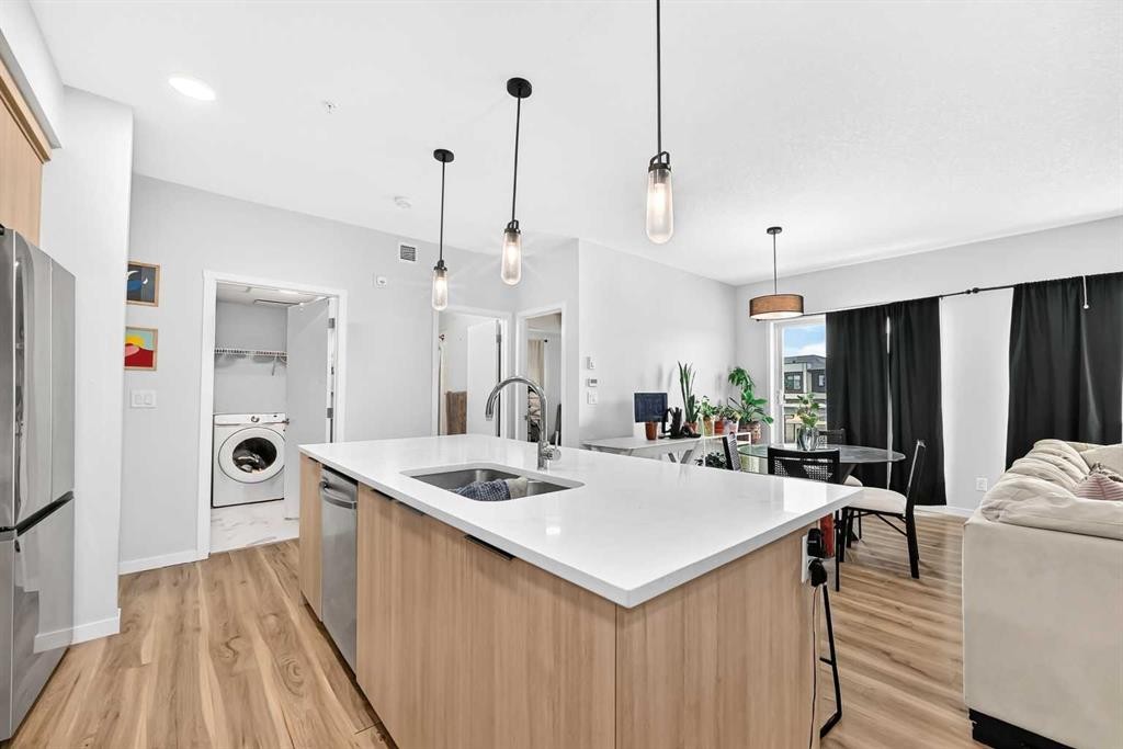3208-220 Seton Grove Se, Calgary, AB - Indoor Photo Showing Kitchen With Double Sink With Upgraded Kitchen