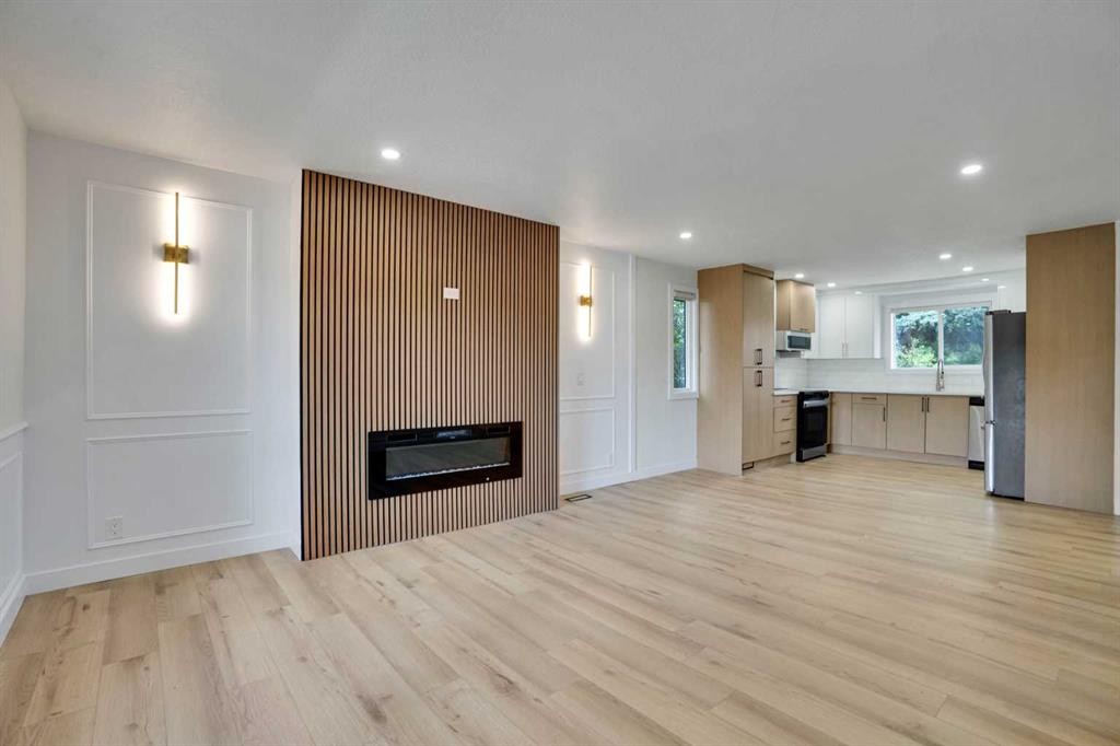 1903 62 Street Ne, Calgary, AB - Indoor Photo Showing Living Room With Fireplace