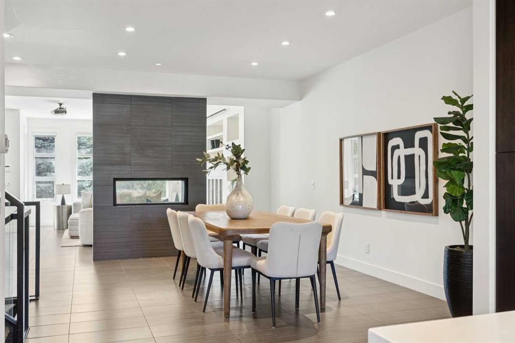 1711 27 Street Sw, Calgary, AB - Indoor Photo Showing Dining Room With Fireplace