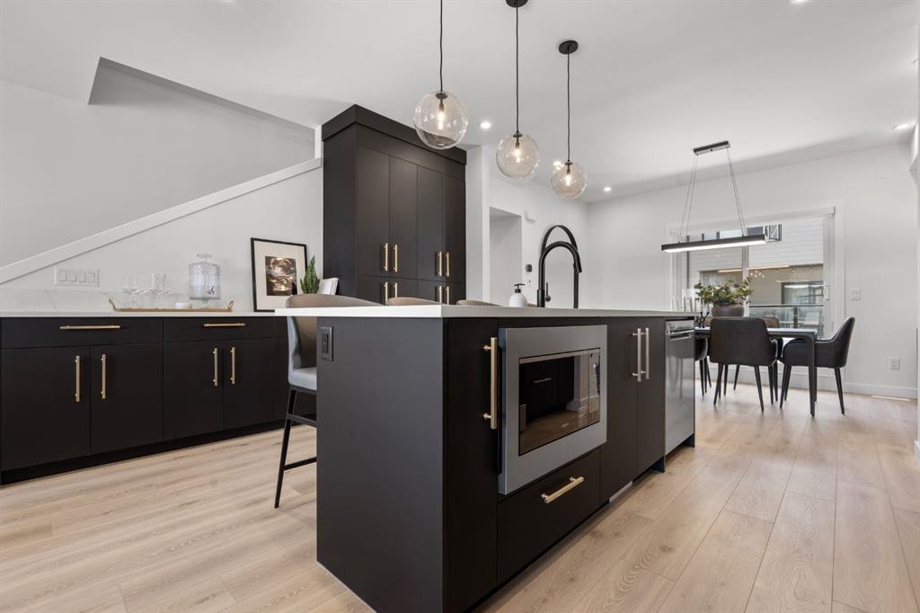 512-8155 8 Avenue Sw, Calgary, AB - Indoor Photo Showing Kitchen With Upgraded Kitchen