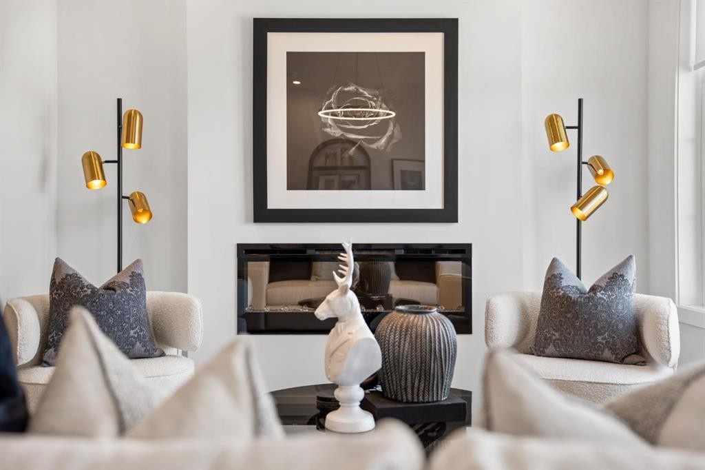 512-8155 8 Avenue Sw, Calgary, AB - Indoor Photo Showing Living Room With Fireplace