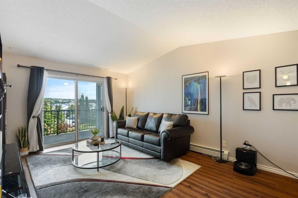 413-33 Arbour Grove Close Nw, Calgary, AB - Indoor Photo Showing Living Room